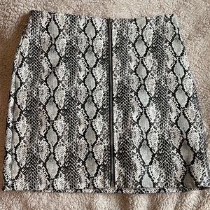 Snake print leather skirt